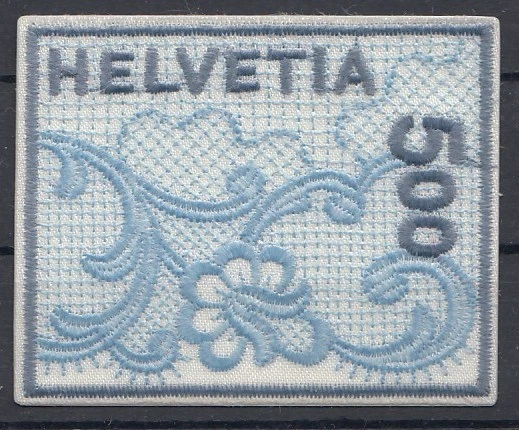 Switzerland (Helvetia)2000 Embroidered Blue Self Adhesive Stamp Unusual and Exotic , World’s First Embroidery Stamp
